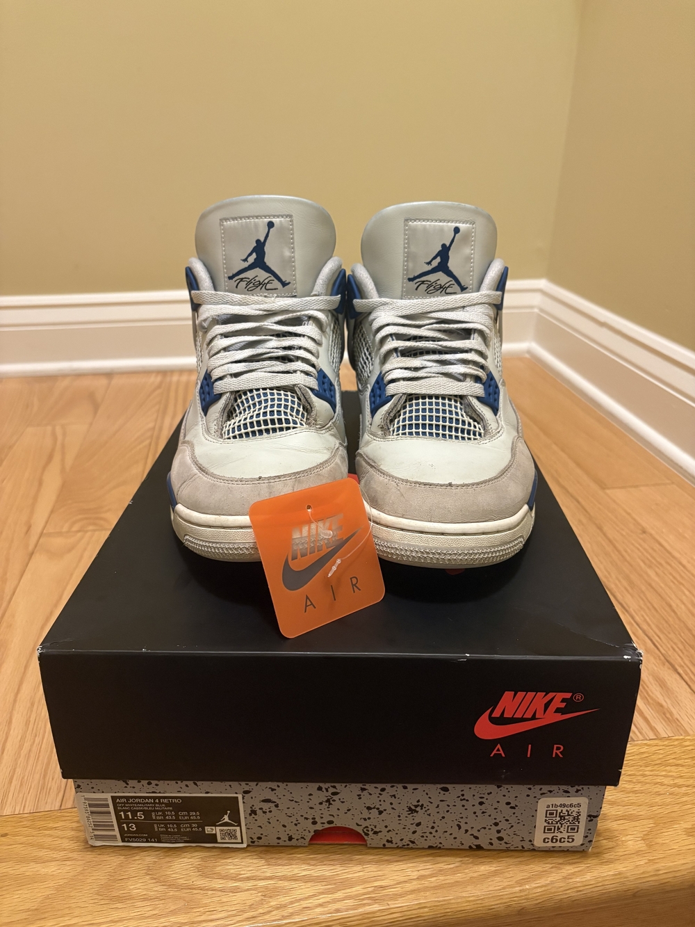 Air Jordan 4 Retro White & Military Blue Sneakers